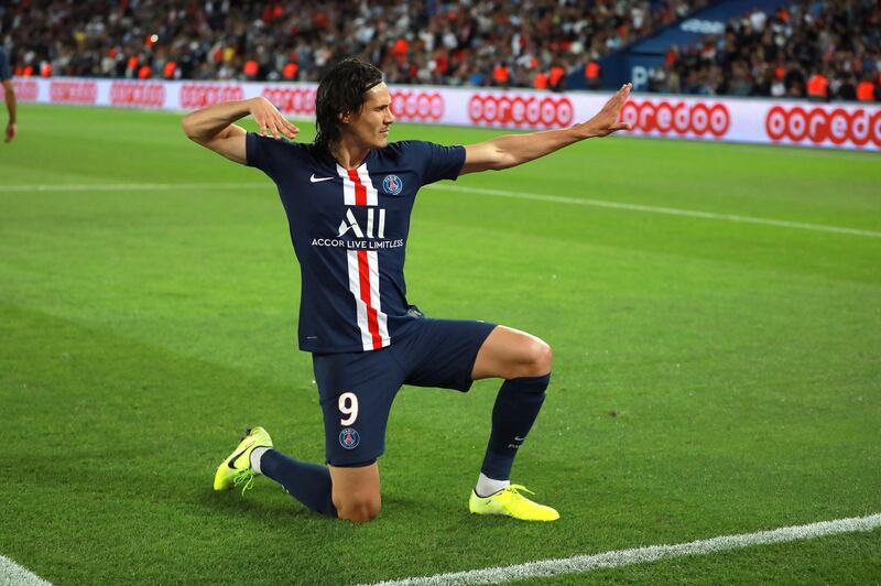 Edinson Cavani celebrates after scoring from the spot.  EPA