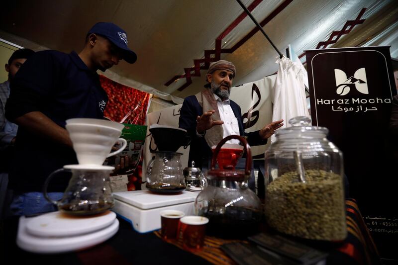 Yemenis prepare Arabic coffee during a ceremony on the International Coffee Day, in Sanaa. EPA