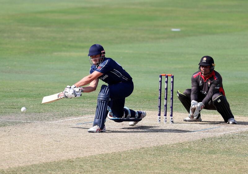 Dubai, United Arab Emirates - October 30, 2019: George Munsey of Scotland scores more runs during the game between the UAE and Scotland in the World Cup Qualifier in the Dubai International Cricket Stadium. Wednesday the 30th of October 2019. Sports City, Dubai. Chris Whiteoak / The National