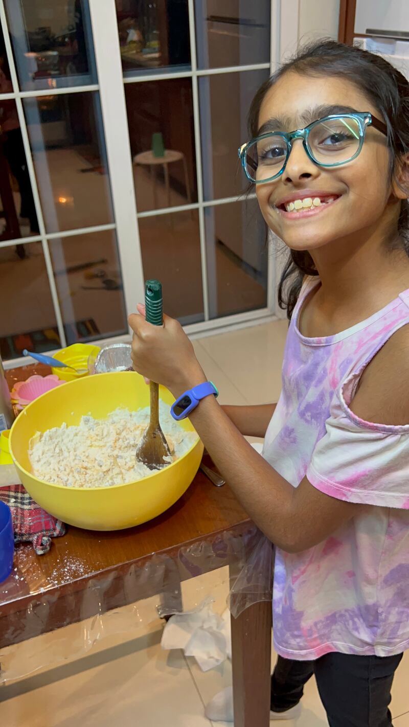 Anya, a Year 5 pupil at Jumeirah Primary School, prepares a mix for cookies that will be sent to earthquake survivors in Turkey and Syria. Courtesy: Cherry Pachisia