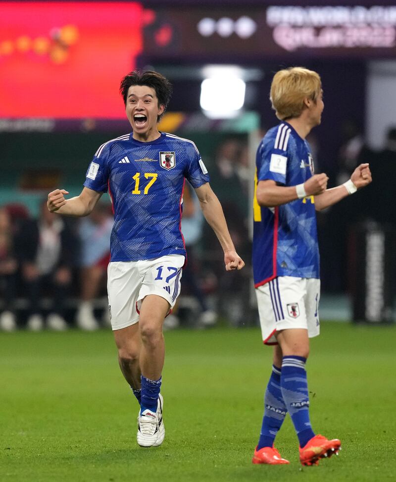 Japan's Ao Tanaka celebrates the end of the match. Getty