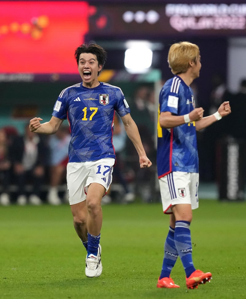 Japan's Ao Tanaka celebrates the end of the match. Getty