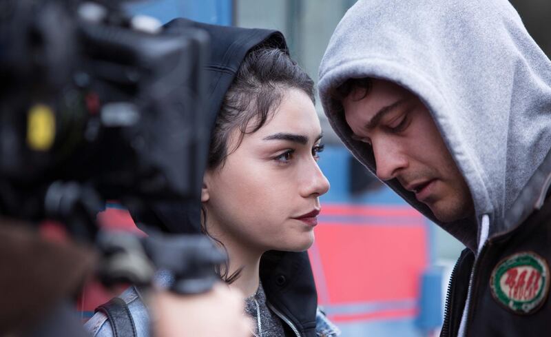 Cagatay Ulusoy, Hazar Erguclu on the set of The Protector. Yigit Eken / Netflix