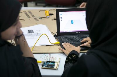 ABU DHABI, UNITED ARAB EMIRATES, Dec. 30, 2014:  
Students from Abu Dhabi high schools work in a 3D printing workshop during Tech Quest, a Higher Colleges of Technology program, on Tuesday, Dec. 30, 2015, at the Higher Colleges of Technology Men's College in Abu Dhabi. The program, which celebrates its 15th edition, attracts Emirati students for hands-on workshops and talks with industry speakers that aim to motivate the students to pursue science, technology, engineering and math (STEM) education.(Silvia Razgova / The National)  /  Usage:  Dec. 30  /  Section: AL   /  Reporter:  Roberta Pennington *** Local Caption ***  SR-141230-techquest06.jpg