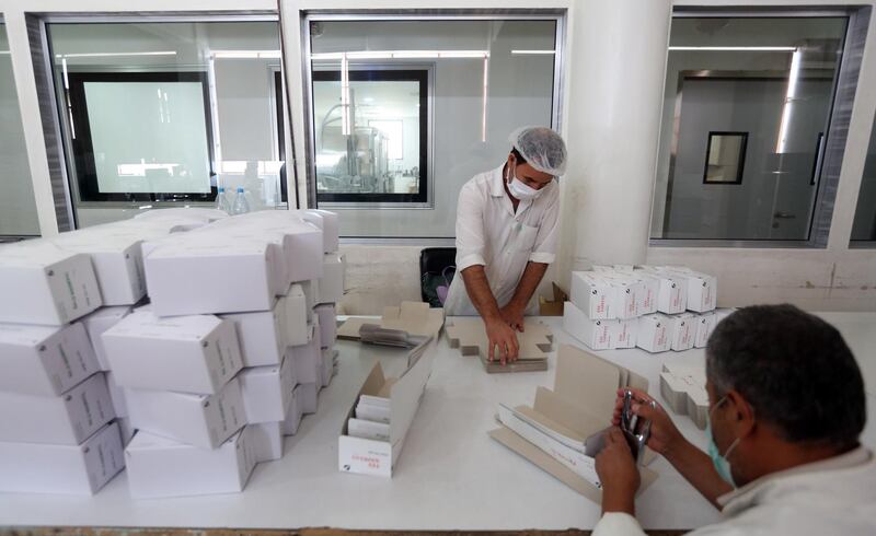 A laboratory technician packs Azithromycin tablets at Syrian Tamico Pharmaceutical Factory. Youssef Badawi / EPA