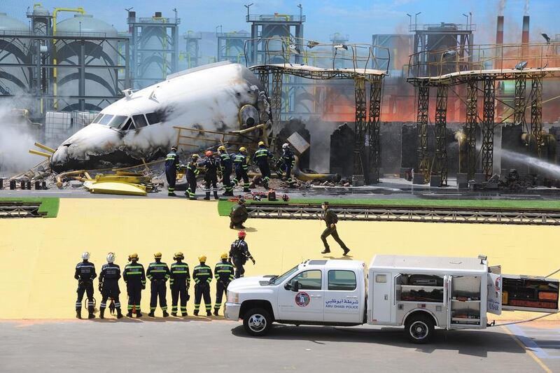 Search and rescue teams take part in a simulation exercise involving a mock airplane crash at ADNEC. Courtesy Security Media