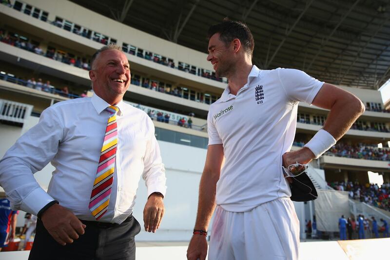 ANTIGUA, ANTIGUA AND BARBUDA - APRIL 17:  Sir Ian Botham (L) congratulates James Anderson of England after surpassing his record of 383 Test wickets and becoming England's highest Test wicket bowler during day five of the 1st Test match between West Indies and England at the Sir Vivian Richards Stadium on April 17, 2015 in Antigua, Antigua and Barbuda.  (Photo by Michael Steele/Getty Images)