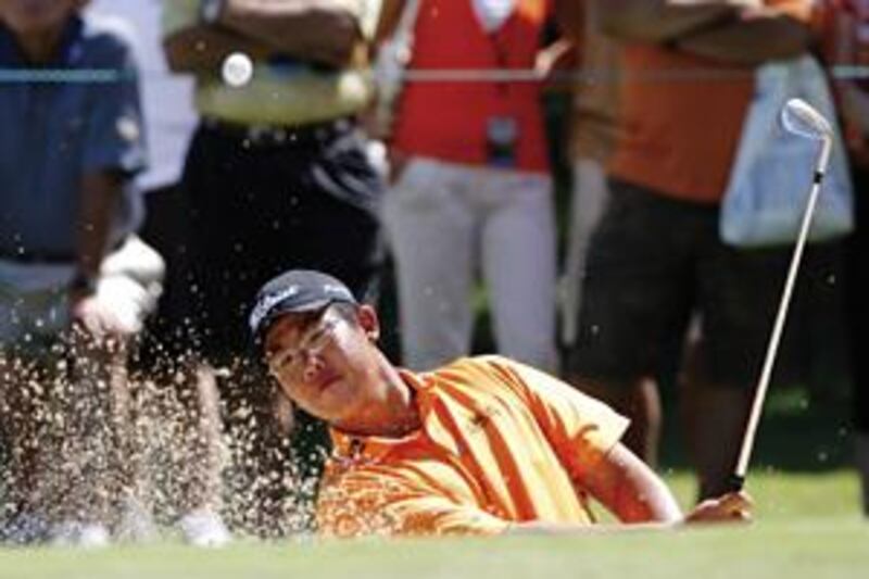 Byeong-Hun An hits out of a bunker during the final round of the US Amateur Championship.