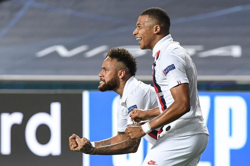 Neymar (L) celebrates with Kylian Mbappe. EPA