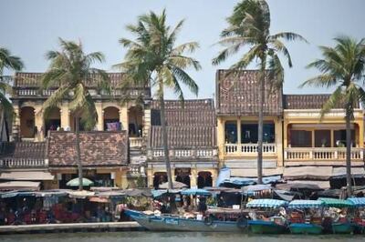 Shop houses along the riverfront in Hoi An, a Unesco World Heritage Site in Vietnam. Getty Images / Lonely Planet Images