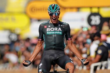 Cycling - Tour de France - Stage 12 - Saint-Paul-Trois-Chateaux to Nimes - France - July 8, 2021 Bora–Hansgrohe rider Nils Politt of Germany celebrates as he crosses the line to win stage 12 REUTERS / Stephane Mahe     TPX IMAGES OF THE DAY