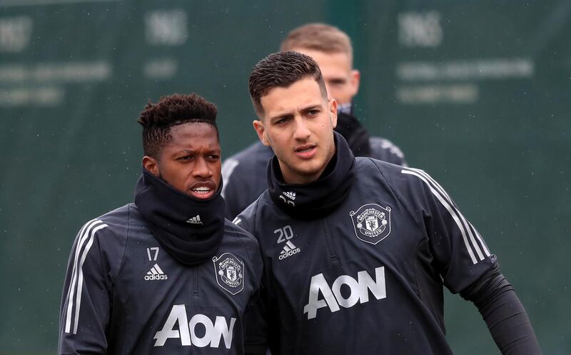 Manchester United's Fred, left, and Diogo Dalot. PA