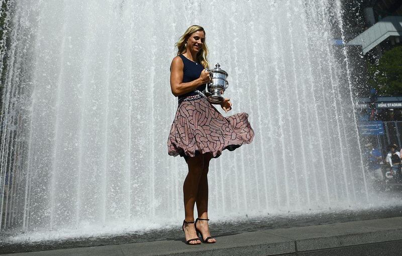 Angelique Kerber poses with her 2016 US Open Women’s singles champion trophy at the USTA Billie Jean King National Tennis Center in New York. Jewel Samad