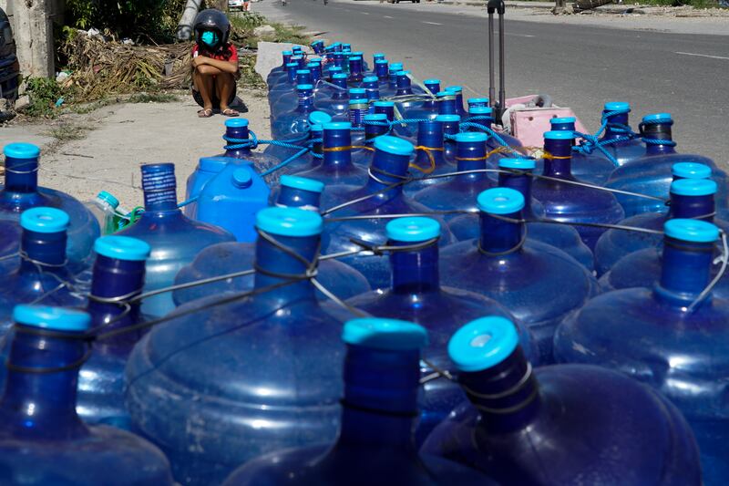 Water bottles are lined up for residents after pipelines were damaged in Cebu, central Philippines. AP Photo