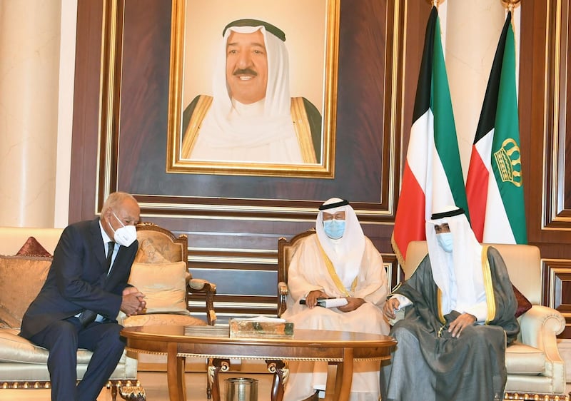 Ahmed Aboul Gheit, Secretary General of the Arab League, offers condolences to Kuwait's new Emir Sheikh Nawaf Al Sabah, at Kuwait international airport's emiri terminal in the capital. AFP