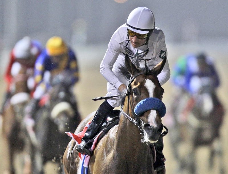 Well Armed ridden by jockey Aaron Gryder wins the 14th Dubai World Cup in 2009 at the last running of the race at Nad Al Sheba racecourse. Kamran Jebreili / AP