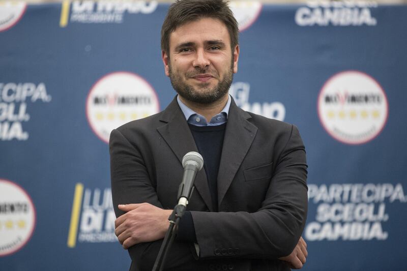 Alessandro Di Battista, Italy's anti-establishment Five Star Movement lawmaker, pauses while delivering a speech at the Five Star electoral center in Rome, Italy, on Monday, March 5, 2018. Exit polls in Italy showed the nation was likely to have a hung parliament. An Opinio Italia projection showed Silvio Berlusconi's bloc was likely to win 225 to 265 seats in the 630-seat lower house, but no single party or coalition would be able achieve the necessary votes to form a government. Photographer: Alessia Pierdomenico/Bloomberg