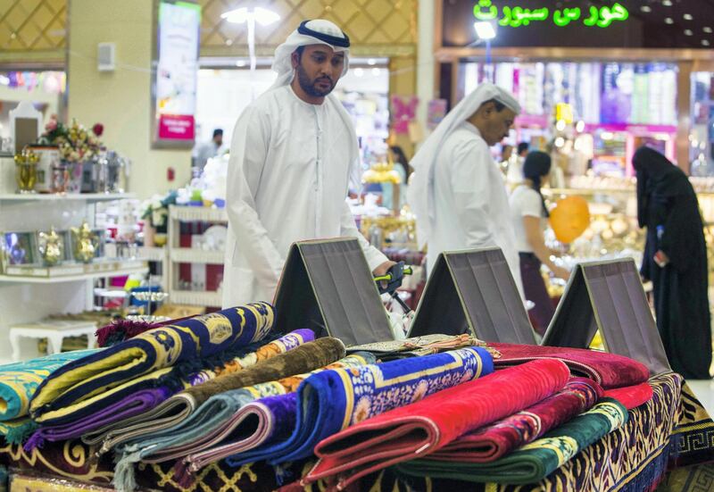 DUBAI, UNITED ARAB EMIRATES, 04 May 2018 - Local shoppers checking out Ramadan related items at Ramadan Market that opens May 3 till 19 at  Dragon Mart 2.  Leslie Pableo for The National for Ellen Fortini's story
