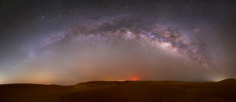 A panorama of the Milky Way core taken from the Abu Dhabi desert.