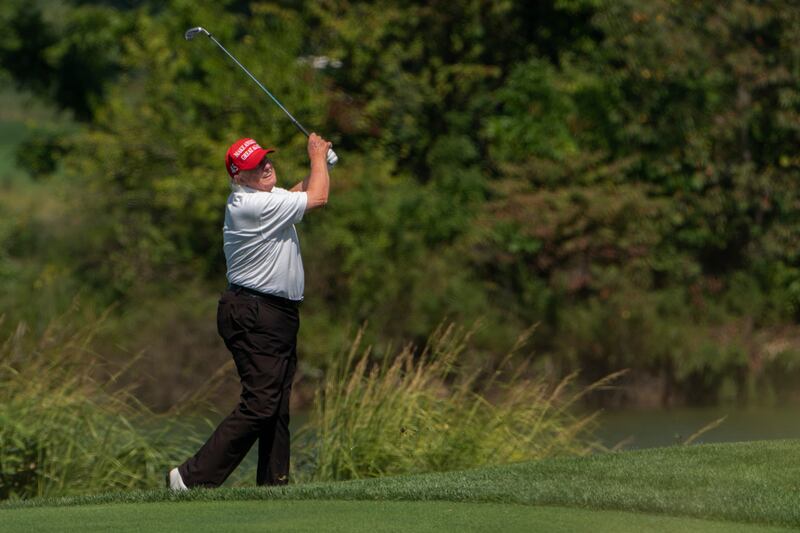 Former president Donald Trump plays golf at Trump National Golf Club in Sterling, Virginia, in early September. AP