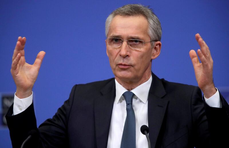FILE PHOTO: NATO Secretary General Jens Stoltenberg gestures during a news conference ahead of a NATO defence ministers council at the alliance headquarters in Brussels, Belgium February 15, 2021. Olivier Hoslet/Pool via REUTERS/File Photo