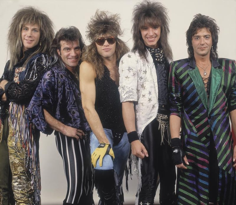 Portrait of American rock band Bon Jovi backstage before a performance in Illinois, early March 1987. Pictured are, from left, David Bryan, Tico Torres, Jon Bon Jovi, Richie Sambora, and Alec John Such. Getty Images