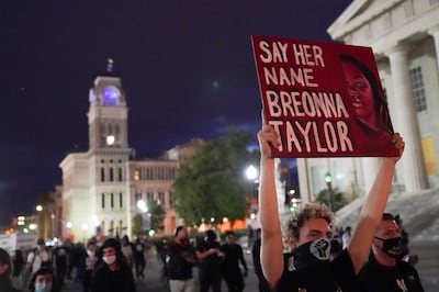 FILE - In this Sept. 24, 2020, file photo, protesters march in Louisville, Ky. Hours of material in the grand jury proceedings for Taylorâ€™s fatal shooting by police have been made public on Friday, Oct. 2. (AP Photo/John Minchillo, File)