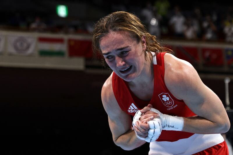 Ireland's Kellie Anne Harrington celebrates after winning against Brazil's Beatriz Ferreira after their women's light (57-60kg) boxing final bout.