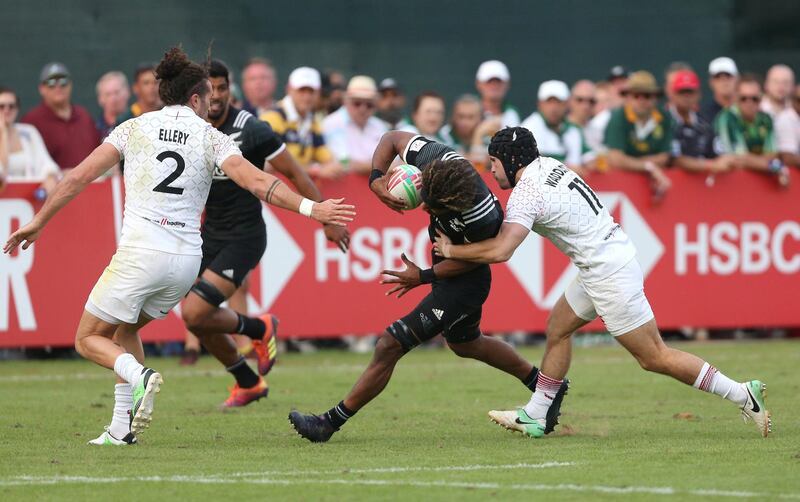 England's Michael John Ellery and Ethan Waddleton in action with Masirewa. Reuters