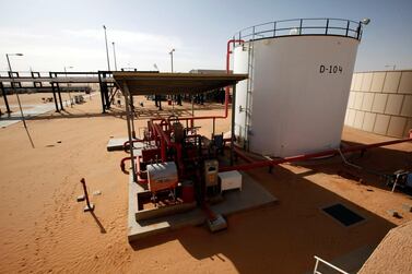 Storage tanks at Libya's El Sharara oil field. The country's oil production was about 1.3 million barrels a day before the closure of oil ports in the east. Reuters