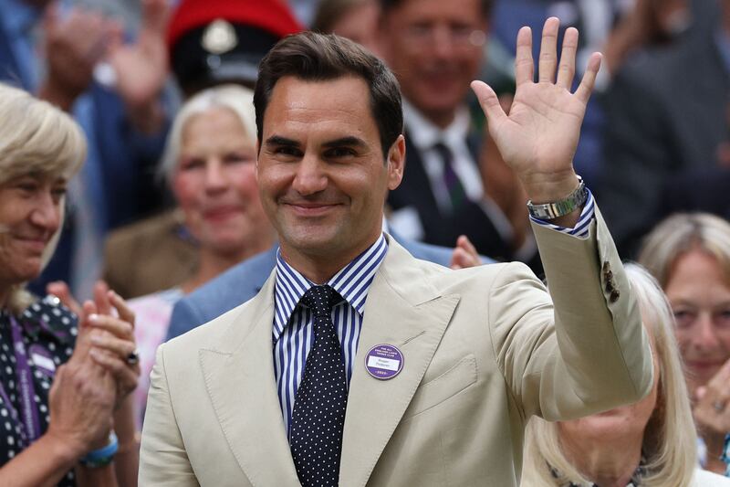 Roger Federer acknowledges the crowd as he is given a tribute at Centre Court on Tuesday. AFP