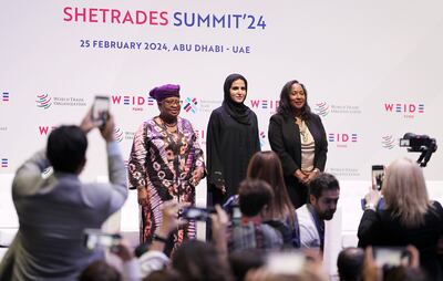 From left, WTO head Ngozi Okonjo-lweala, Alia Al Mazrouei, chief executive of Khalifa Fund for Enterprise Development, and Pamela Coke-Hamilton, executive director of the International Trade Centre, during the SheTrades Summit in Abu Dhabi. Pawan Singh / The National