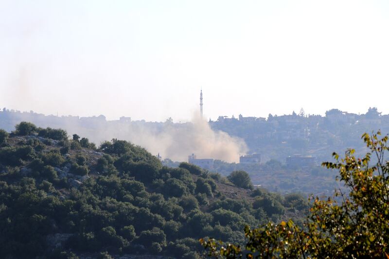 An Israeli shell hits the outskirts of the Lebanese village of Dhayra, close to the countries' border, on November 5.  AFP