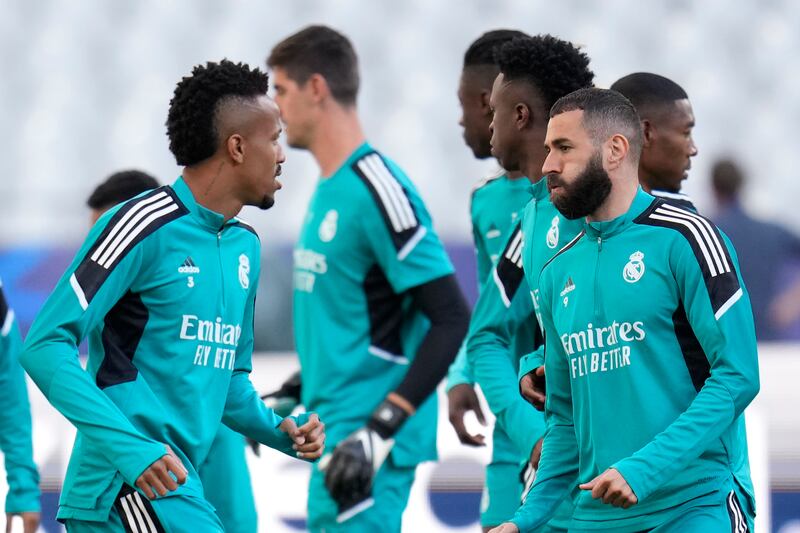 Real Madrid's Karim Benzema, right, and Eder Militao train at the Stade de France. AP
