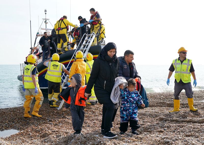 A group thought to be migrants arrives in Dungeness, Kent. The Lords committee described current policies to process such arrivals as extreme. PA