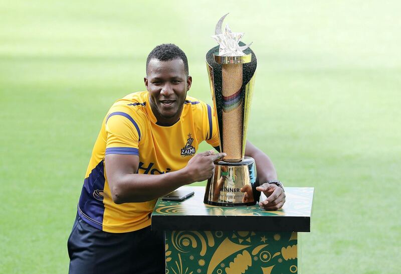 DUBAI , UNITED ARAB EMIRATES , FEB 20  – 2018 :- Darren Sammy , captain of the Peshawar Zalmi with the trophy during the press conference of PSL T20 cricket tournament at Dubai International Cricket Stadium in Dubai. ( Pawan Singh / The National ) For Sports. Story by Paul Radley