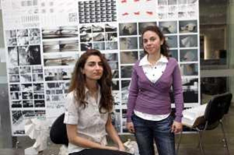 March 11, 2010 - Sharjah, UAE - Abir Fawaz, 22, a senior design student (right), and Sharmeen Syed, 24, Senior architecture student (left), from the American University of Sharjah. They are participating in an internship program with Art Dubai. (Nicole Hill / The National) 