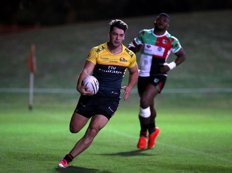 Abu Dhabi, United Arab Emirates - October 12, 2018: Hurricanes' Stuart Jordan scores in the game between Abu Dhabi Harlequins and Dubai Hurricanes in the West Asia Premiership. Friday, October 12th, 2018 at Zayed Sports City, Abu Dhabi. Chris Whiteoak / The National