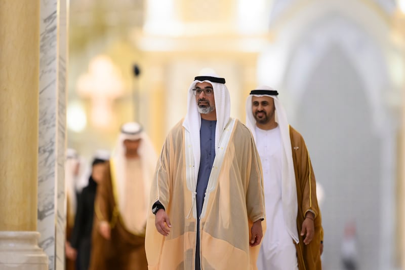 Sheikh Khaled and Sheikh Theyab bin Mohamed, chairman of the Office of Development and Martyrs Families Affairs, attend the reception. Abdulla Al Neyadi / UAE Presidential Court