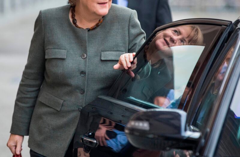 German Chancellor Angela Merkel arrives for exploratory talks in a bid to form a new government in Berlin. Odd Andersen / AFP Photo