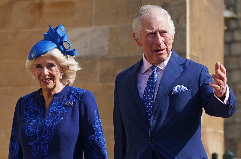 Britain's King Charles III and Queen Consort Camilla arrive at St George's Chapel, Windsor Castle. AFP