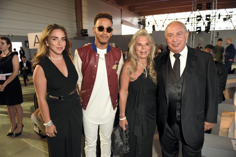 CANNES, FRANCE - MAY 21:  Chloe Green , Lewis Hamilton, Tina Green and Sir Philip Green attend the Fashion for Relief event during the 70th annual Cannes Film Festival at Aeroport Cannes Mandelieu on May 21, 2017 in Cannes, France.  (Photo by Antony Jones/Getty Images)