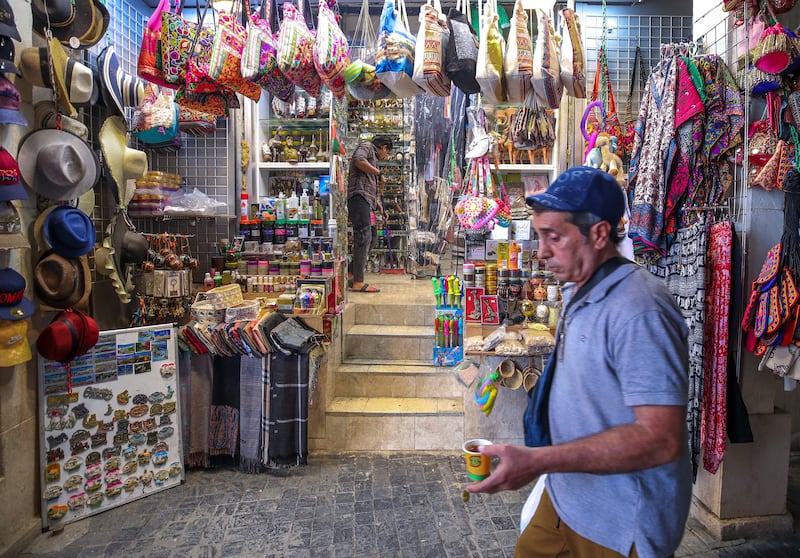 A shopper browses at Mutrah Souq.