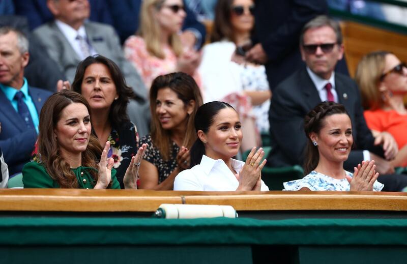 Britain's Catherine, Duchess of Cambridge, with Meghan, Duchess of Sussex, and Pippa Middleton in the Royal Box ahead of the final between Serena Williams of the U.S. and Romania's Simona Halep REUTERS/Hannah McKay