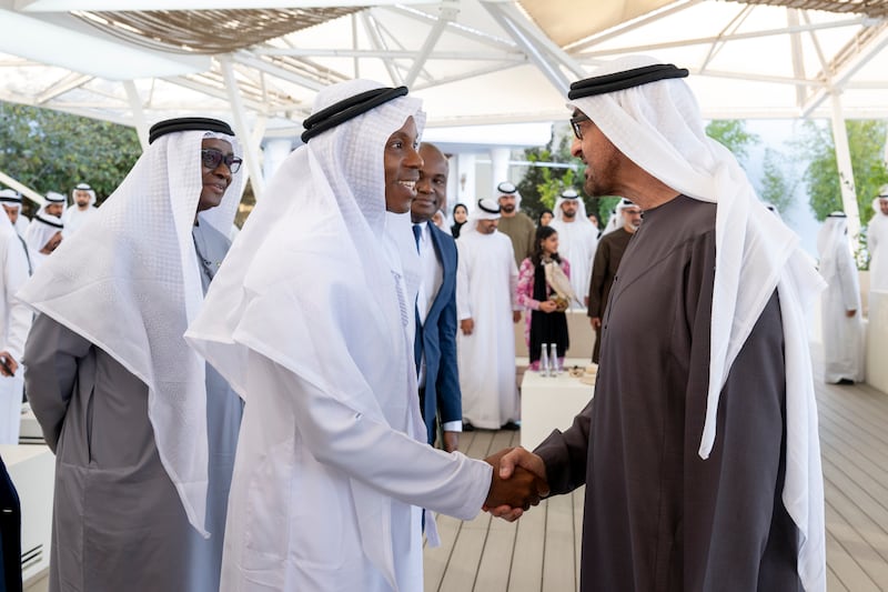 Sheikh Mohamed greets David Sengeh, Chief Minister of Sierra Leone. Abdulla Al Bedwawi / UAE Presidential Court 