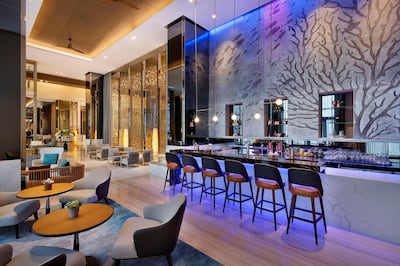 Osmo – Lounge & Bar overlooks the waters of Yas Bay and serves coffees, lunch, afternoon tea and creative beverages. Courtesy Hilton