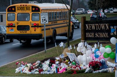 Teddy bears, photos, letters and tributes from spontenous memorials - such as this one on December 18, 2012 - in the days after the Sandy Hook shooting made up the 'sacred soil' of the Sandy Hook Memorial. AFP