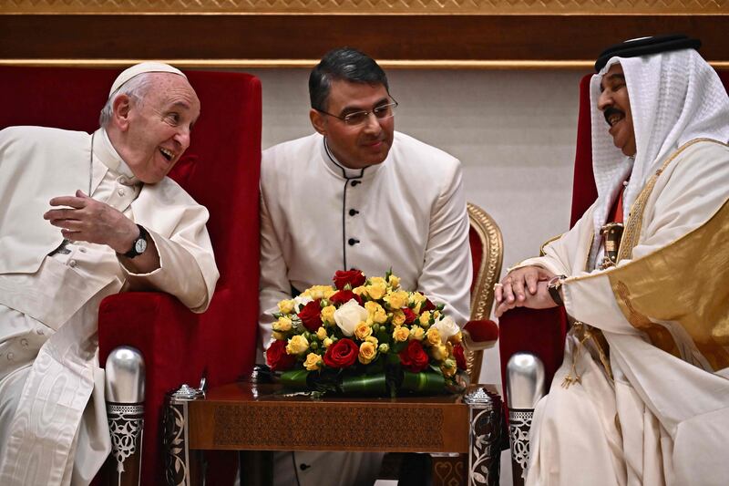 Pope Francis, left, speaks with Bahrain's King Hamad during their meeting in the capital Manama. The Pope is making the November 3-6 visit to participate in a government-sponsored conference on East-West dialogue and to minister to Bahrain's small Catholic community. AFP 