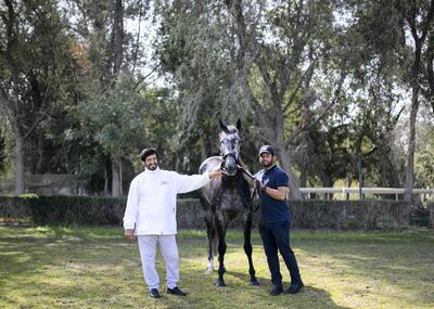 DUBAI, UNITED ARAB EMIRATES. 17 MARCH 2020. 
Emirati trainer Ali Rashid Al Raihe with his assistant Jailani Siddiqi at Grandstand Stables.
(Photo: Reem Mohammed/The National)

Reporter:
Section: