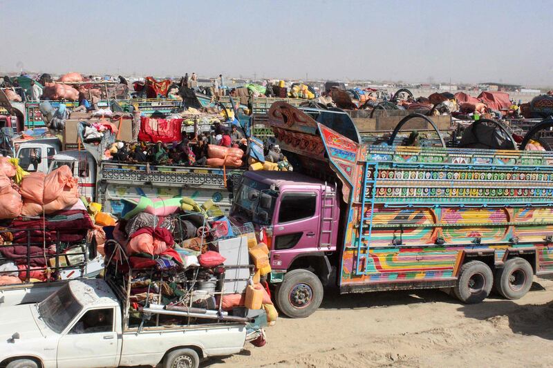 Afghan refugees arrive in trucks and cars to cross the Pakistan-Afghanistan border in Chaman. AFP